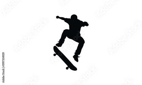 Skateboarder performing mid-air trick silhouette