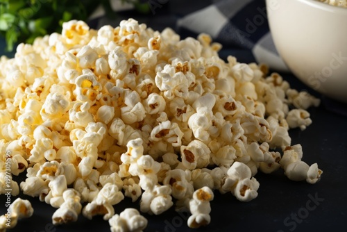 Popcorn Sits in a Bowl in Front of a Warm Fireplace During a Cozy Evening at ...