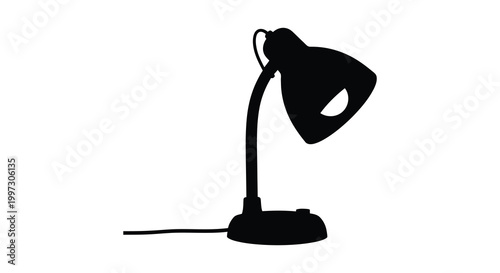 A minimalist black lamp design stands out as a striking silhouette
