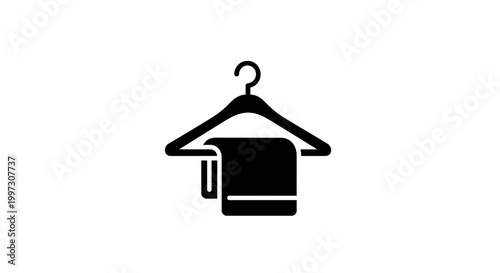Fényképezés Black towel draped over a hanger simple design silhouette