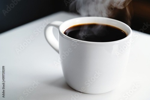 Freshly Brewed Coffee in a White Cup With Steam Rising on a Bright Surface