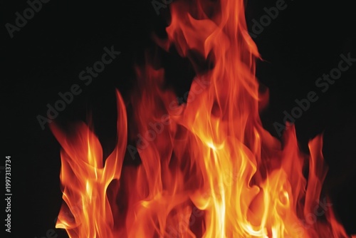 Colorful Flames Dance in the Dark Background During a Fire Event at Night