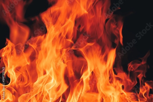 Flames Rise Upward in a Dark Space, Creating a Bright and Dynamic Display of ...