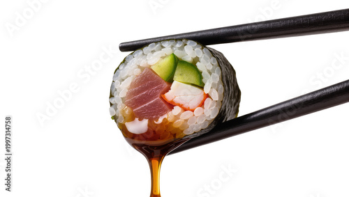 Tableau sur toile Sushi roll with tuna and avocado dripping soy sauce held by chopsticks, isolated