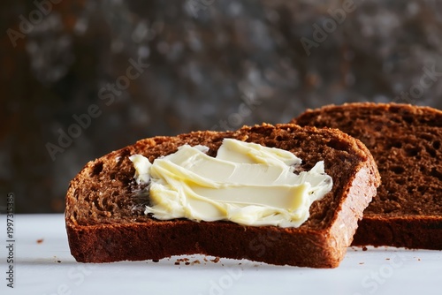 Freshly Baked Bread With Butter Spread on Top Ready to Serve With a Snack or ...