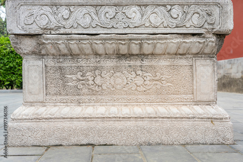 Detail close-up of stone carving pedestal