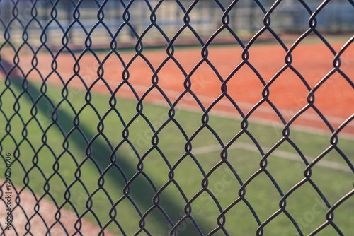 Copy space background baseball field empty public park, close up fence