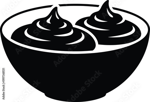 Black bowl with two dollops of whipped cream white dessert