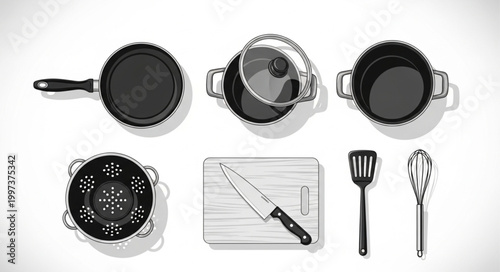 Collection of Kitchen Utensils and Cookware Arranged Artistically.