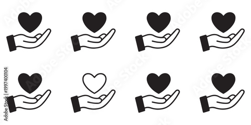 Solid black heart icons held in hands for charity and care concepts