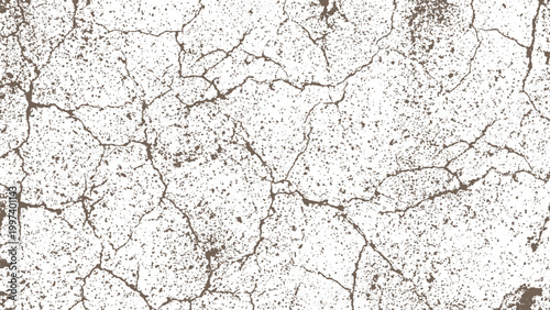 Cracked earth surface with dried mud and small holes and fissures all over