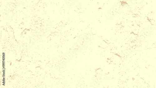 Cream colored textured surface with brown spots and splatters pattern