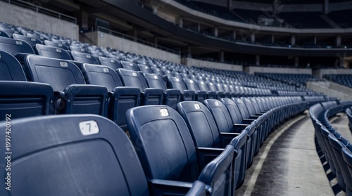 Rows of Empty Navy Blue Plastic Seats in a Large Modern Sports Arena Stadium