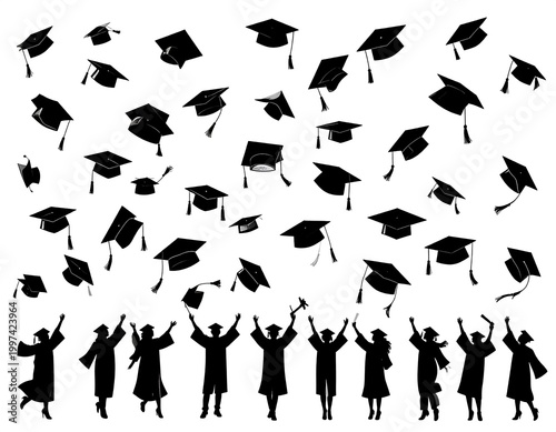 Silhouettes of graduates throwing graduation caps