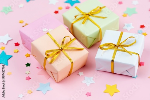 Small Gift Boxes With Ribbon on a Colorful Background for a Celebration or Pa...