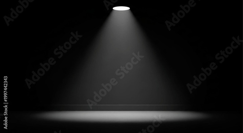 Spotlight over dark stage with black background