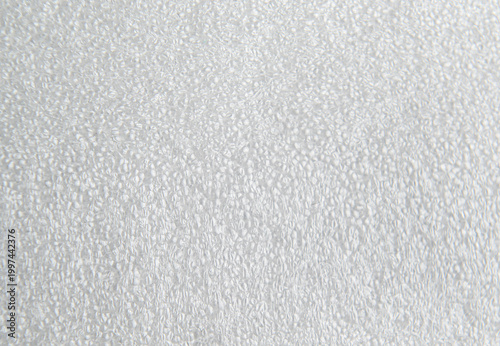 Photos Close up texture of white polyethylene foam surface used for protective packaging inserts, custom case inlays and industrial cushioning