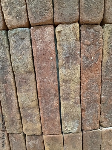 Rustic brick wall texture with natural earthy tones