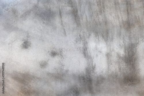 Soft gray textured background with trace of brush strokes