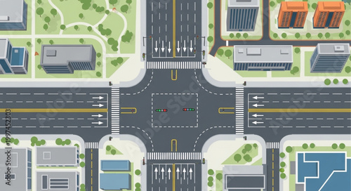 Aerial view of a busy city intersection with traffic and buildings.