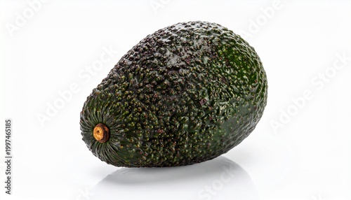 Fresh avocado displayed on white background with green skin