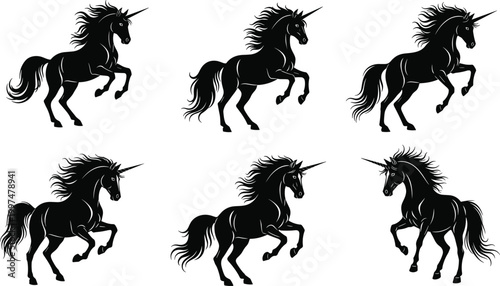 Collection of black unicorn silhouettes rearing up with flowing manes isolated on white background for magical fantasy graphic design elements