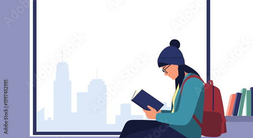 A woman sits by a large window with flate desain city view reading a book.
