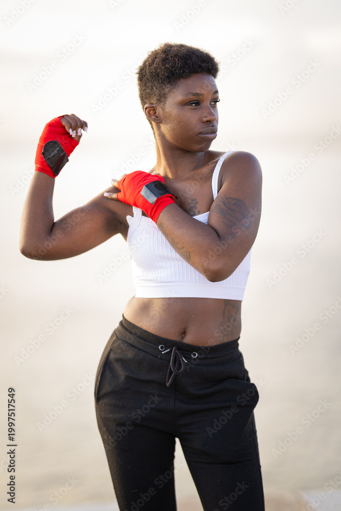 Fototapeta premium African american woman preparing for boxing fitness training