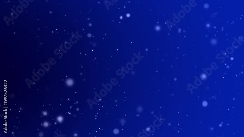 青のグラデーション背景に、丸ボケが星のようにキラキラと輝く、パーティクルの光の背景アニメーション