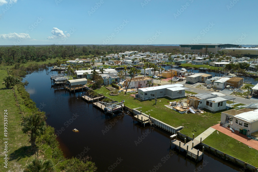 Φωτογραφία Destroyed by hurricane strong winds suburban houses in Florida mobile home residential area