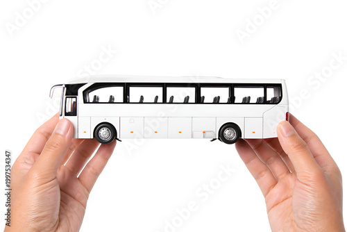 Hands Holding Miniature Bus on White Background – Public Transport and Travel Concept