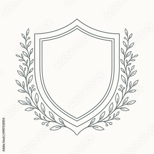 Heraldic shield crest with detailed border and side botanical elements