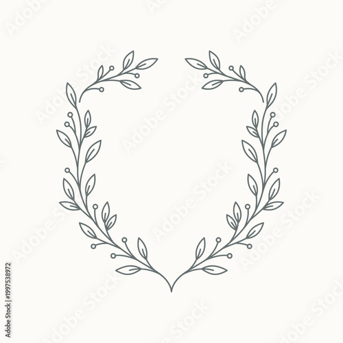 Round botanical wreath symbol with small leaves in soft symmetrical layout