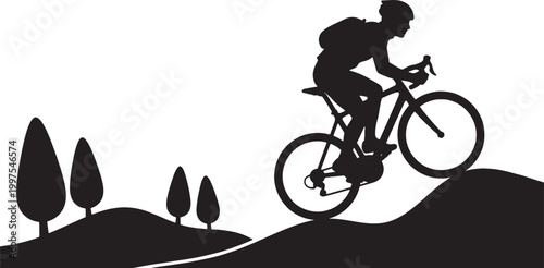 Silhouette of a cyclist wearing a helmet and backpack riding a bicycle on a hilly terrain