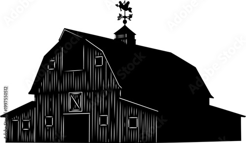 Large traditional rural barn with a weather vane silhouette
