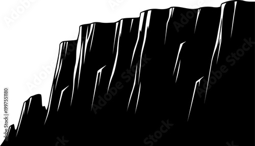 Vertical cliff face towering over landscape