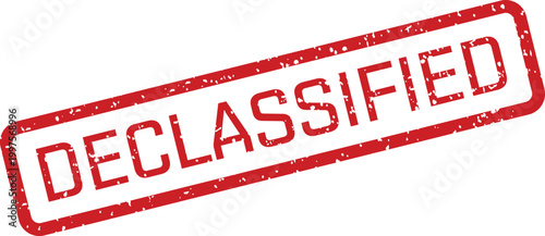 A textured red rubber stamp showing the official word DECLASSIFIED against a clean white backdrop
