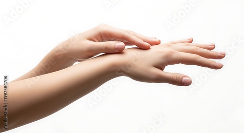 Close-up of a person's hands gently rubbing together, showcasing smooth skin and manicured nails, evoking a sense of calm and self-care.