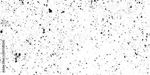 Black grunge texture with splattered ink spots on white background vector graphic design element