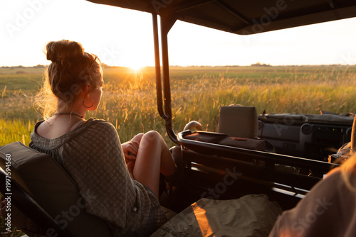Family experiencing a mobile safari, Okavango Delta, Botswana, Africa
