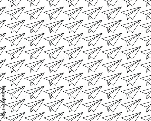 Seamless pattern of hand drawn paper airplanes on a white background