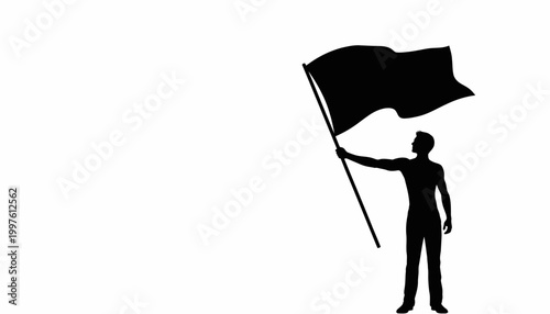 Fotografija Silhouette of a man holding a flag aloft against a white background