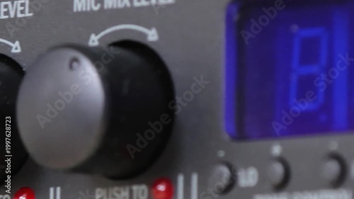 Front control panel of the audio amplifier with level controls and display