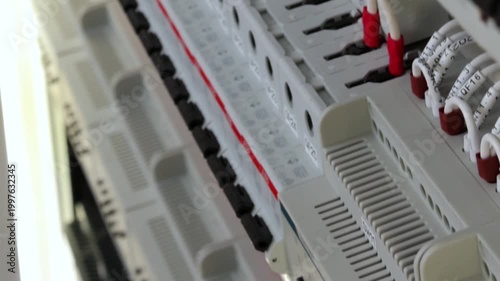 Electrical panel for organizing the power supply of the house on circuit breakers. Close-up. Soft focus. 