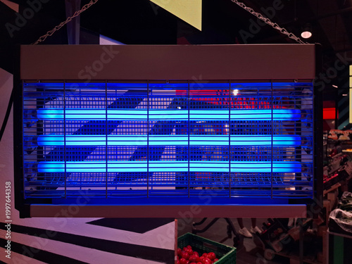 Фотография Electric ultraviolet insecticide insect killer, effective UV lamp trap in shop