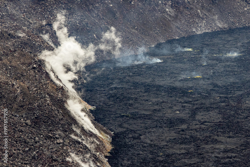 Fotografie Close up view of volcanic steam rising from vents on the floor of Kilauea crater