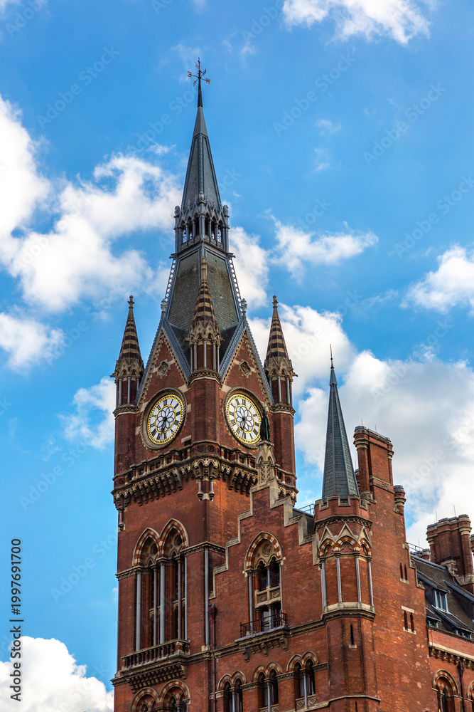 Fototapeta premium St Pancras international railway station clock tower in London in a summer day, England, UK