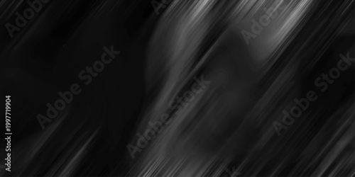 Dark abstract blurred diagonal streaks of deep grey and black creating a dramatic, moody background texture for design