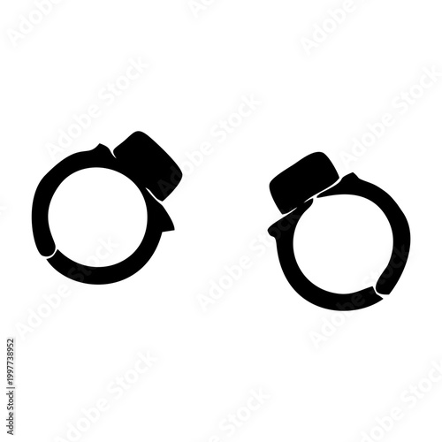 Two black handcuffs isolated on a white background.