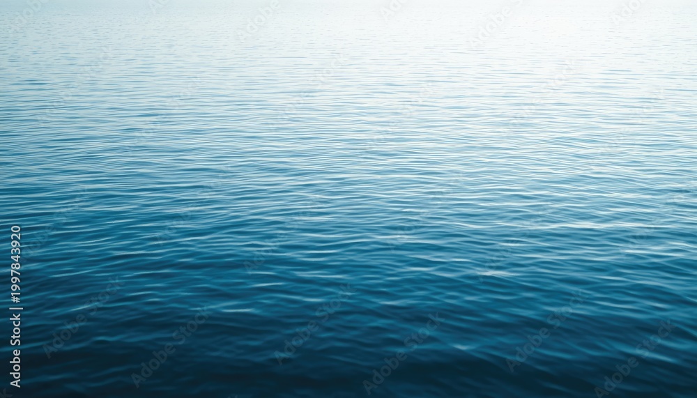 Obraz premium Calm Ocean Surface Ripples for Tranquil Backgrounds in Presentations, Websites, and Meditative Content
